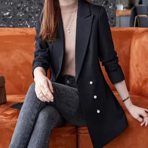 Svart kavaj med pärlknappar